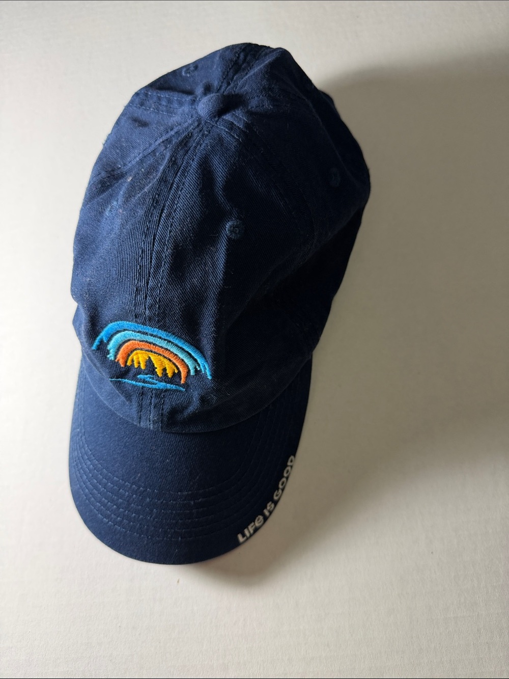 Life Is Good Navy Cap with Blue and Orange Embroidered Wave